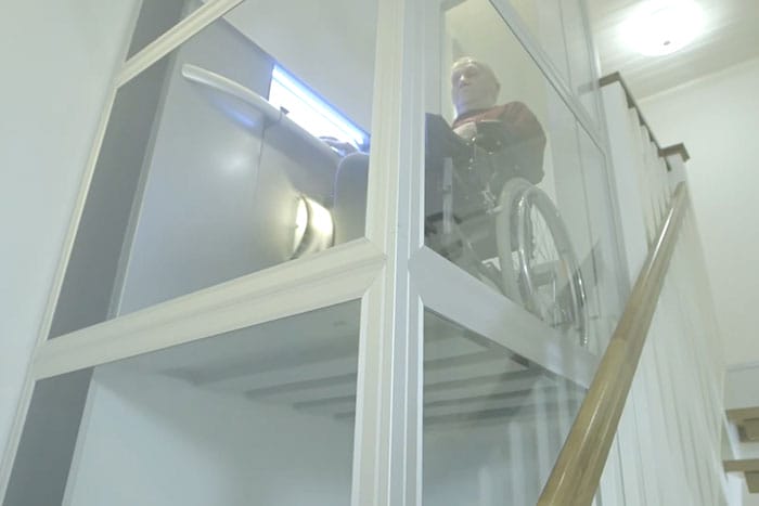 wheelchair user in cibes lift